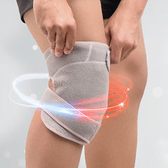 Graue Kniebandage am Knie mit symbolischer roter und blauer Markierung für Wärme und Kälte