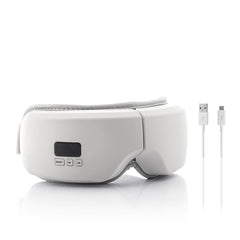 Eyesky-Massagebrille mit USB-C-Ladekabel auf weißem Hintergrund