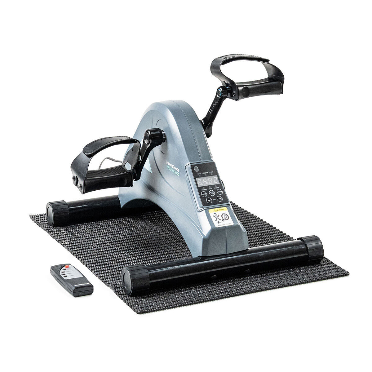 Velora-3000-Pedaltrainer mit Matte und Fernbedienung auf weißem Hintergrund